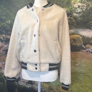 Cozy Cream Teddy Jacket with Black Accents
